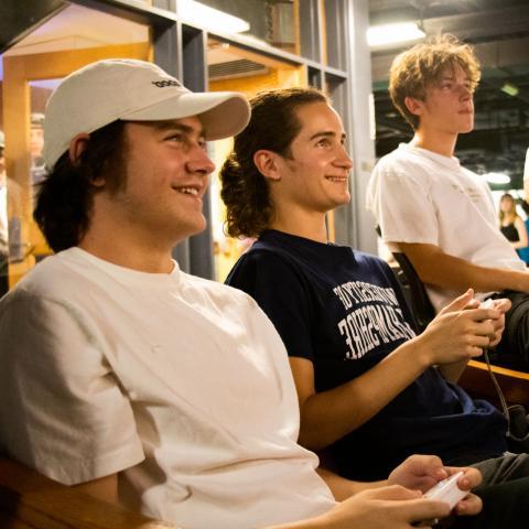 Two students playing Wii